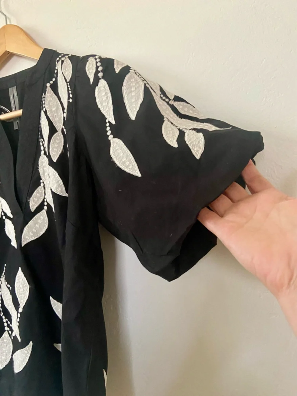 Anthropologie Black Short-Sleeve V-Neck Top with Ivory Leaf Embroidery